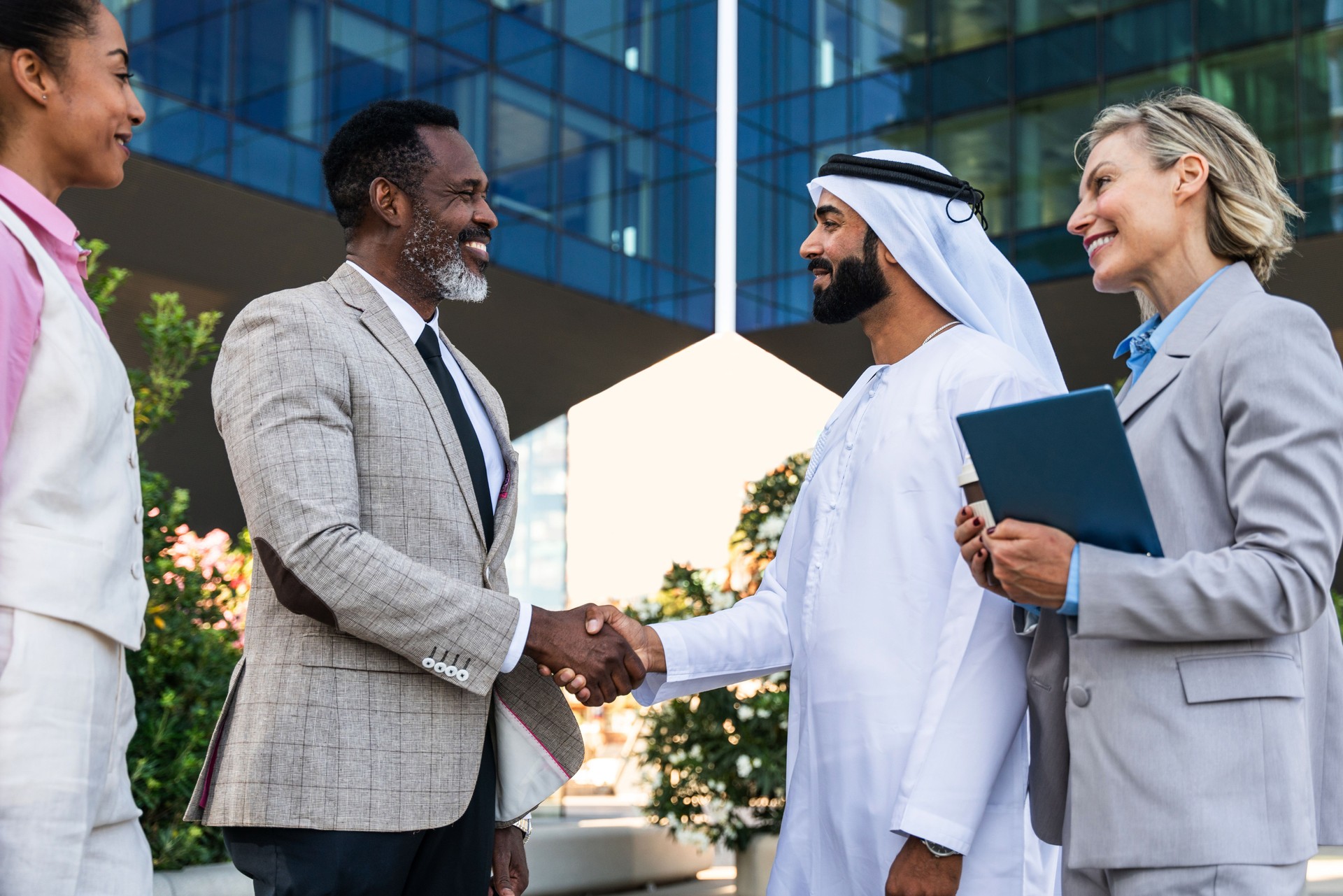 Group of multiethnic business people meeting an emirati businessman